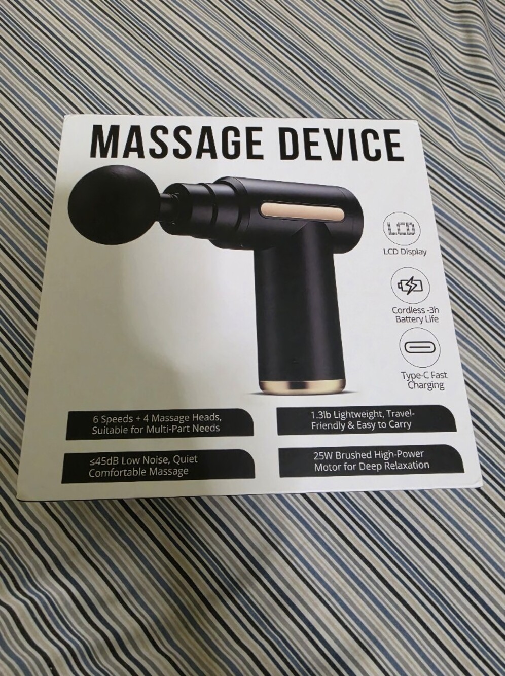 Cordless Massage Gun in Black with Gold Accents